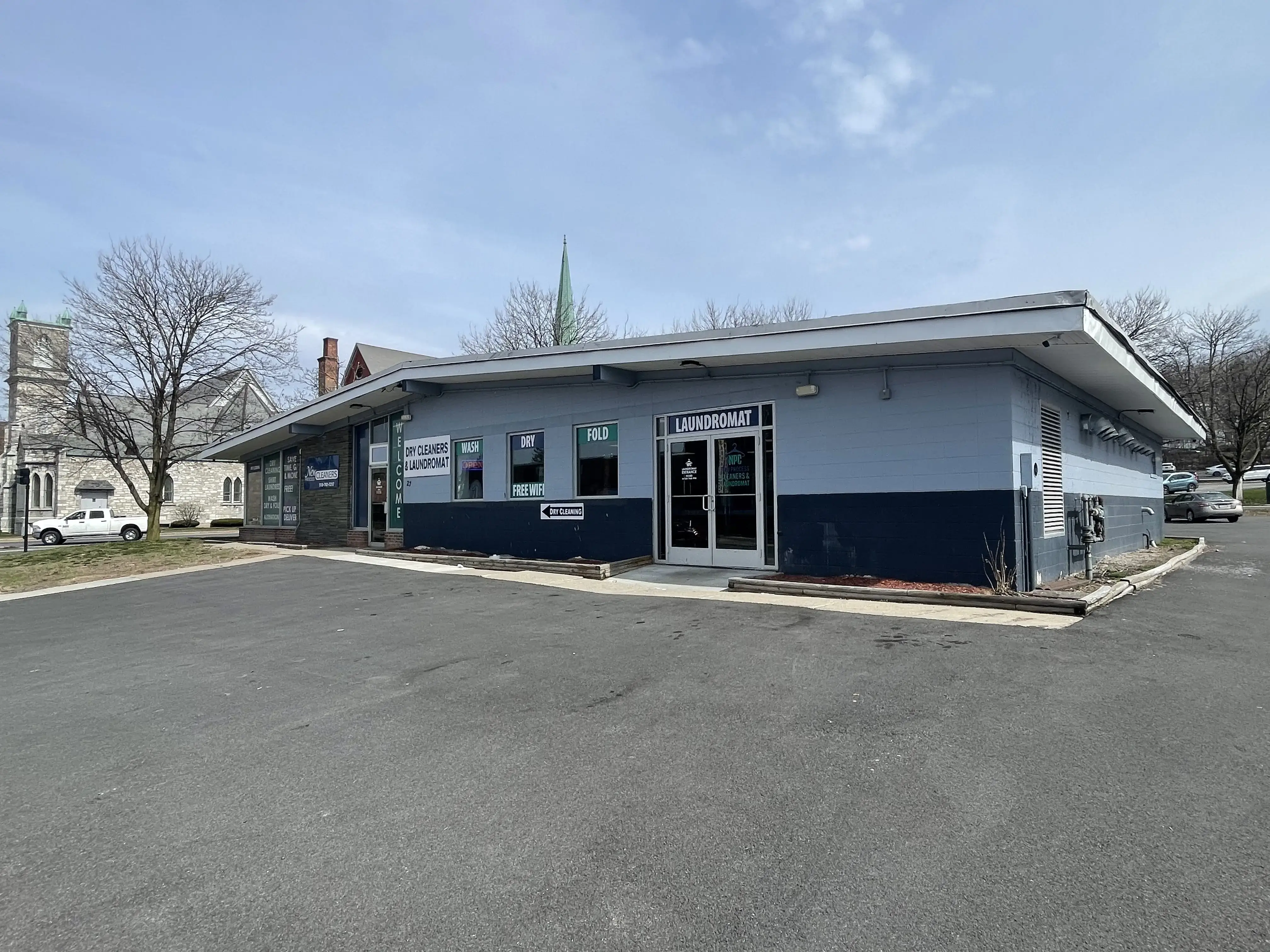 New Process Cleaners & Laundromat - Image 13