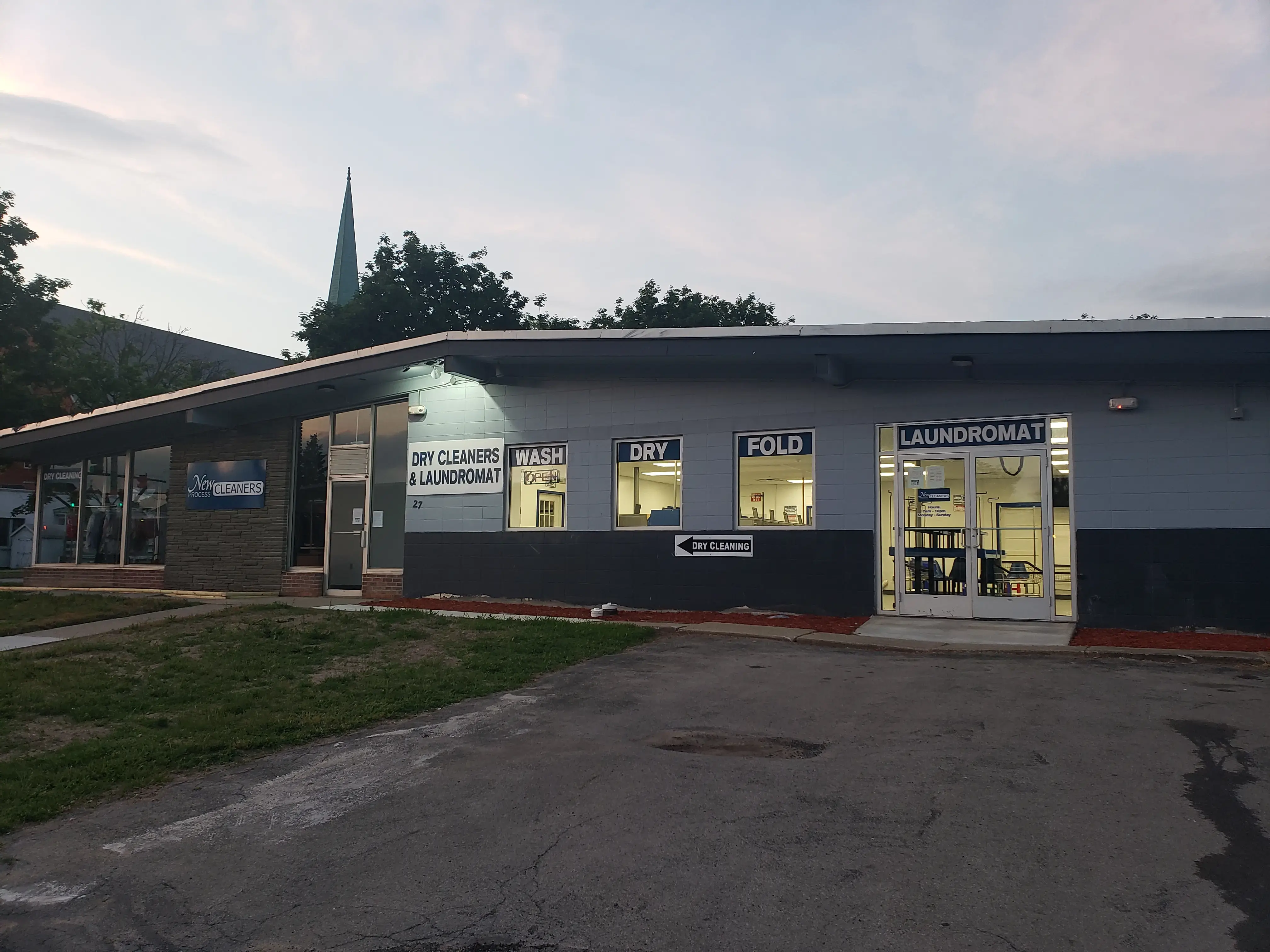 New Process Cleaners & Laundromat - Image 7