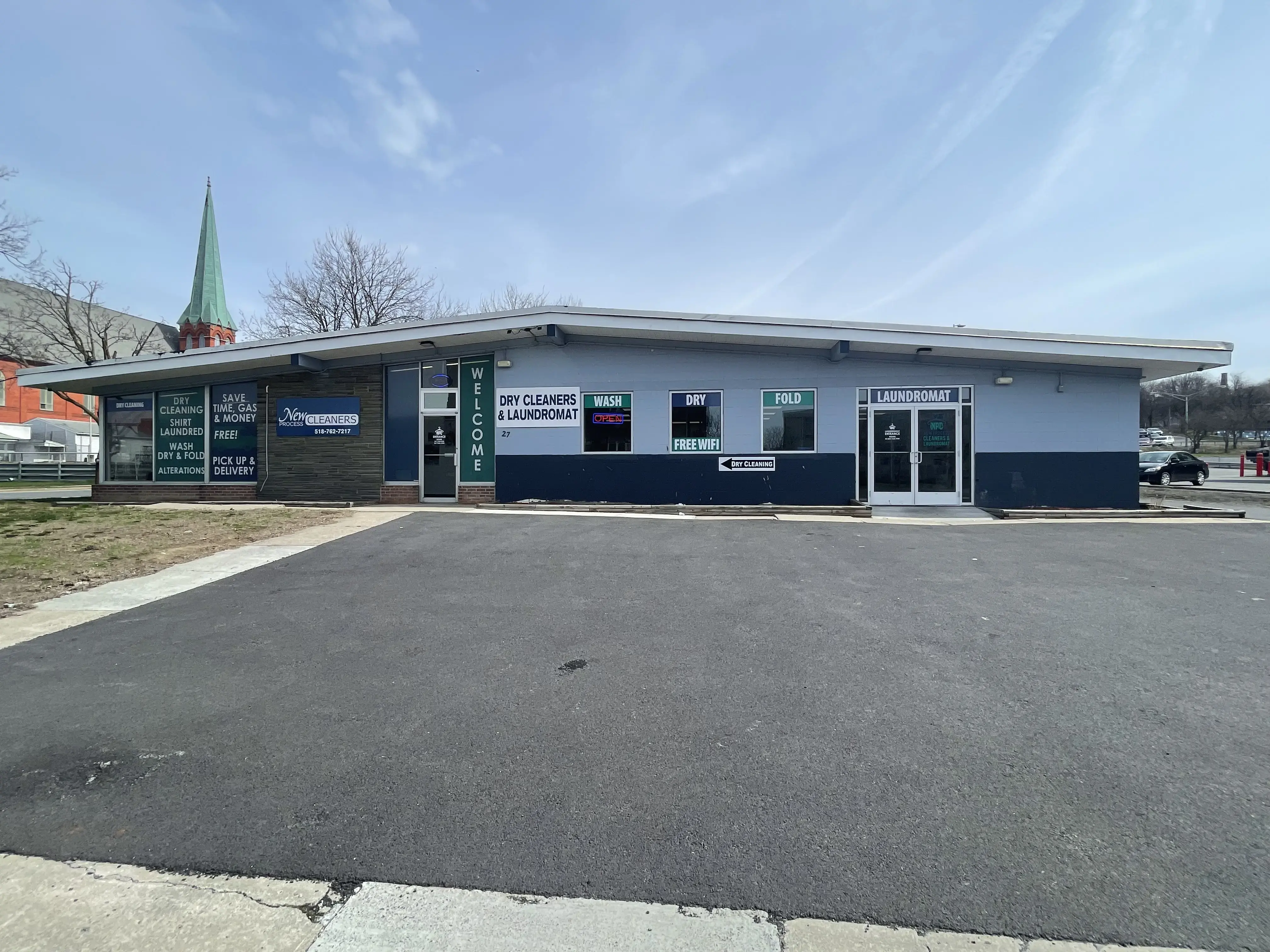 New Process Cleaners & Laundromat - Image 17