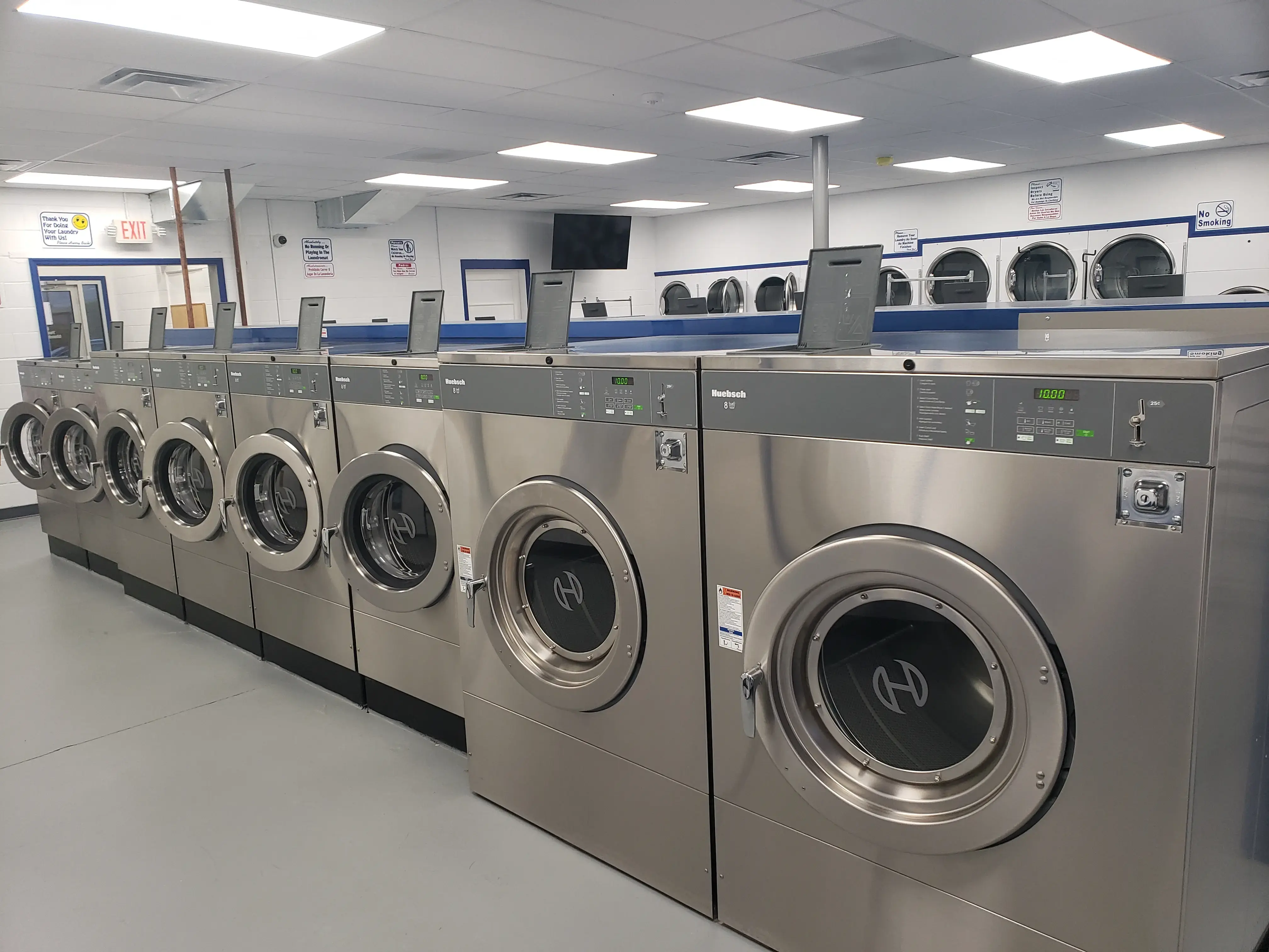 New Process Cleaners & Laundromat - Image 18