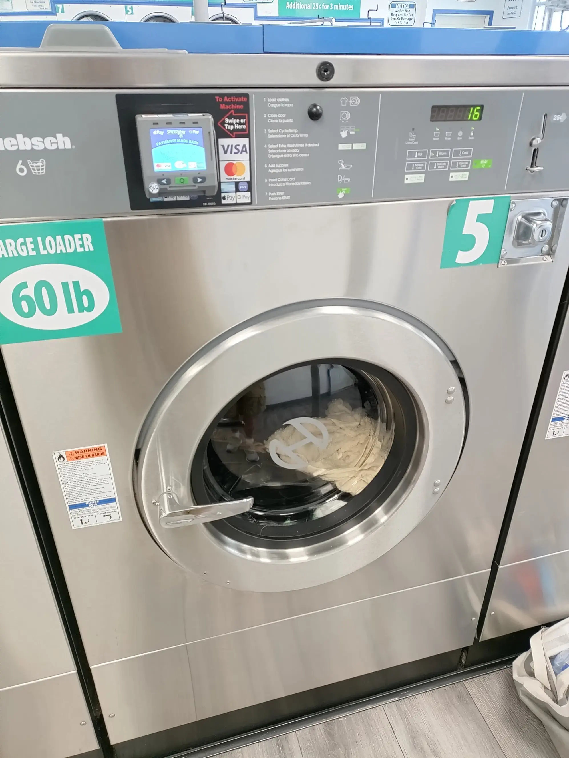 New Process Cleaners & Laundromat - Image 6