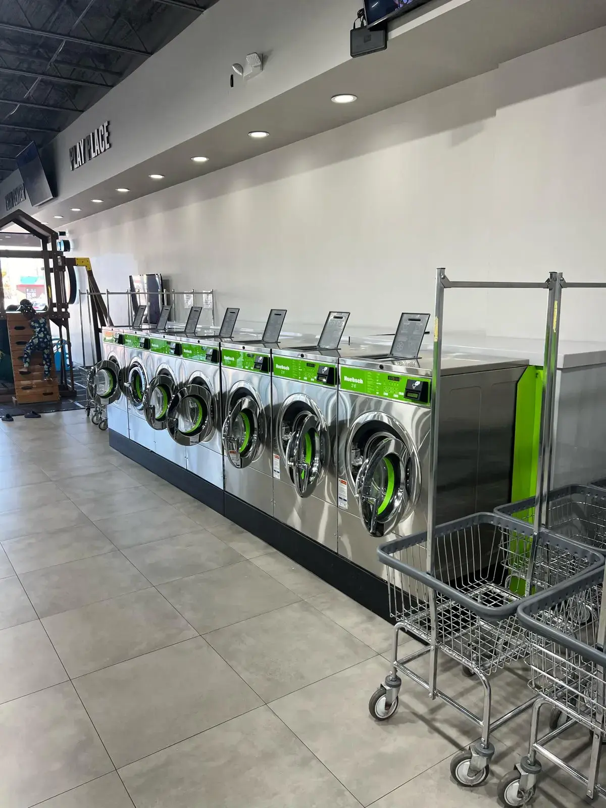 Oasis Washateria Post Oak - Image 1