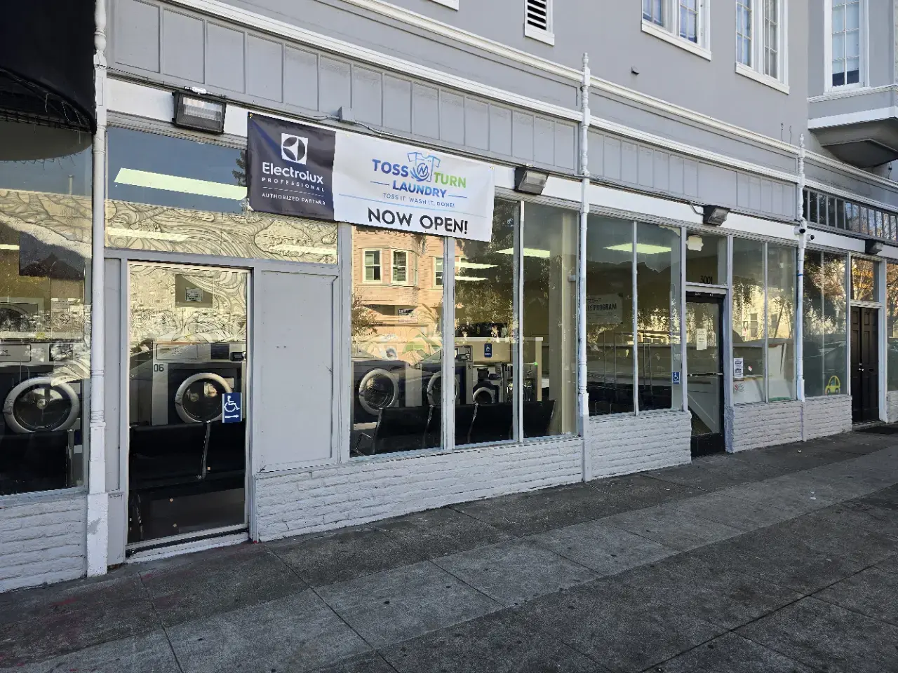 Toss N Turn Laundry - Image 1